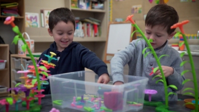 students are playing with toys