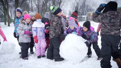 students are playing with snow ball