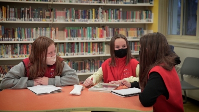 Students in library with masks