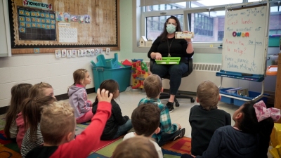 students in a class with a teacher